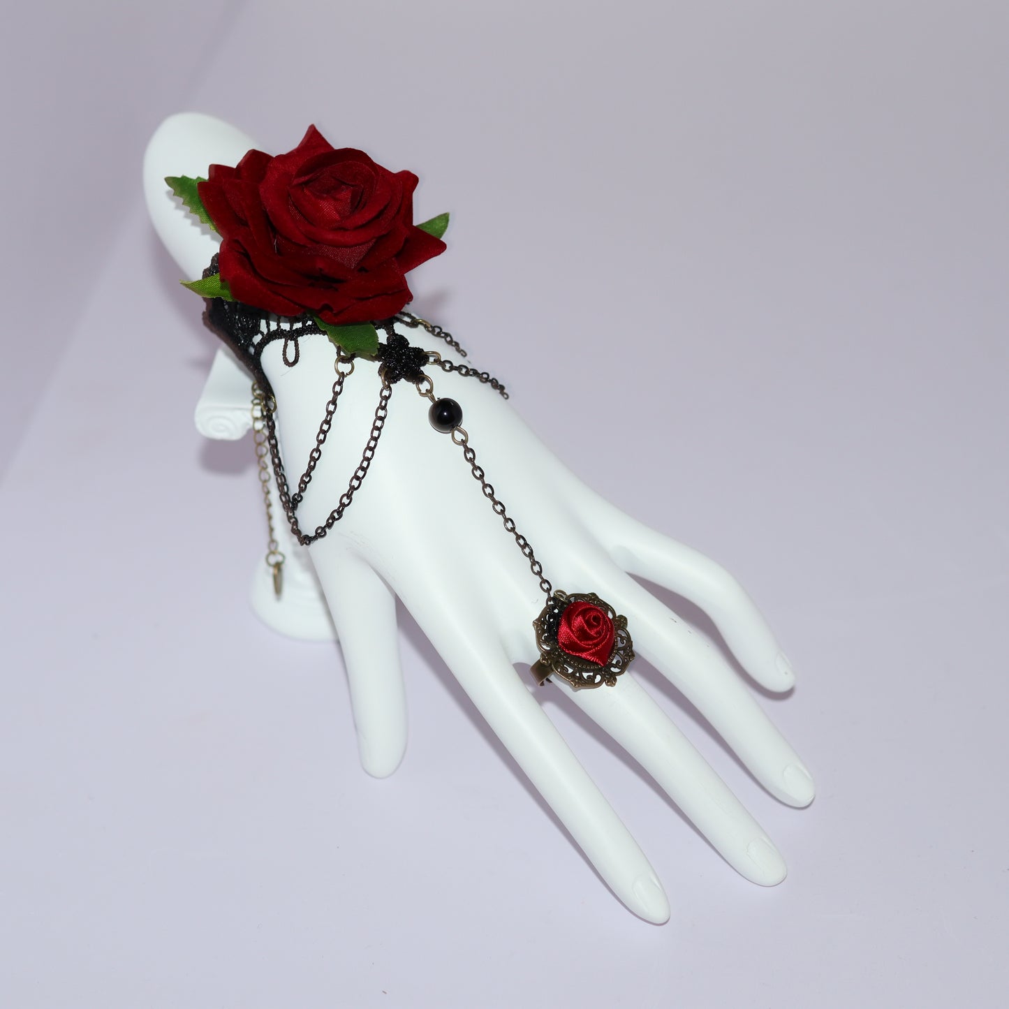 Glove Bracelet with a Red Flower